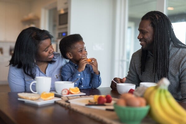A family eating fruit together