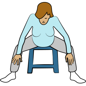 Pregnancy relaxation exercise: Sitting on a chair with legs apart, leaning forward with hands on legs.