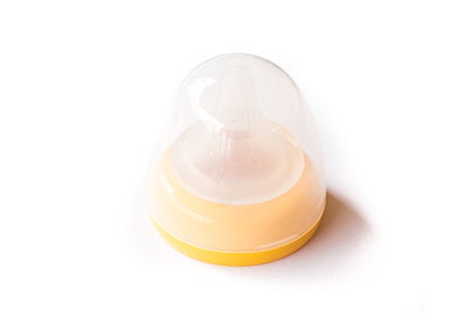 Teat and lid of a baby bottle.