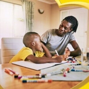 An adult teaches a child