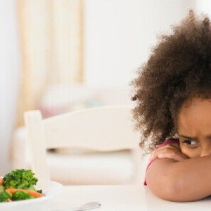 A child refusing eating vegetables