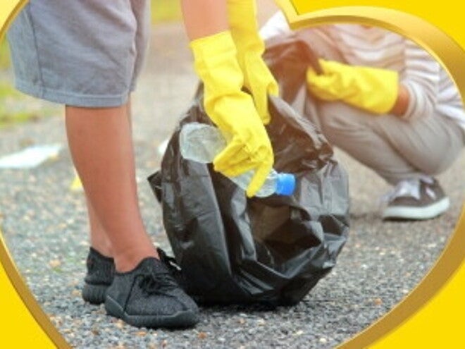 Simple ways to nurture the planet from home 2 teenagers picking up plastics on a road