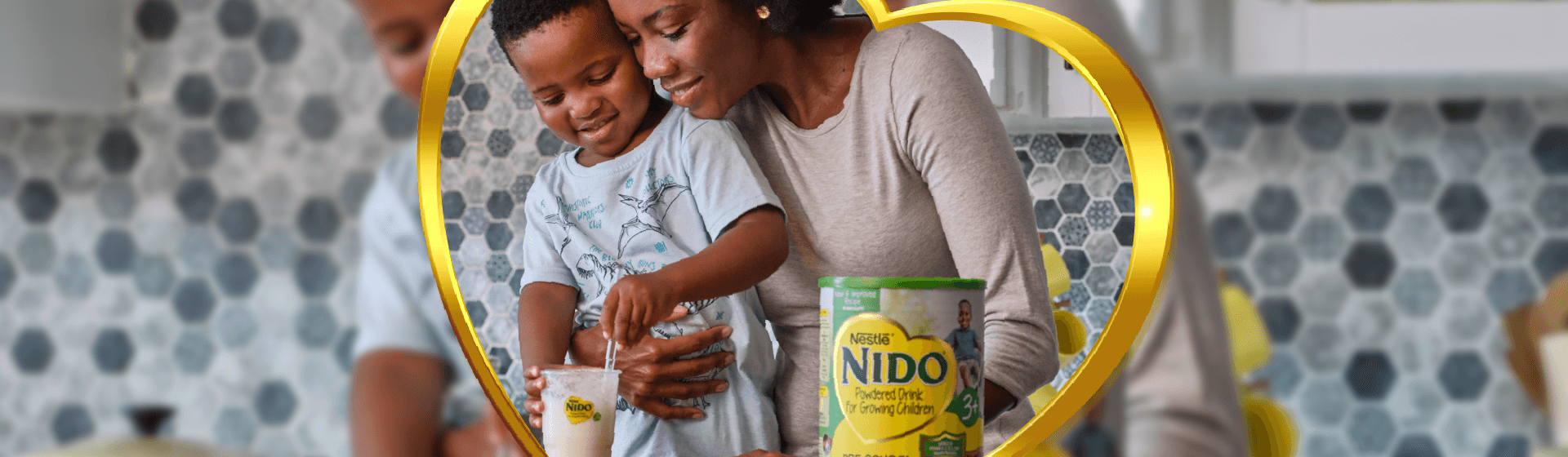 Nido 3 plus in a kitchen with a mum and her son preparing this product.